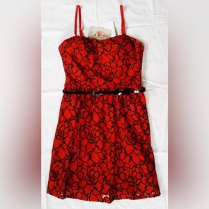 Red dress with black floral design